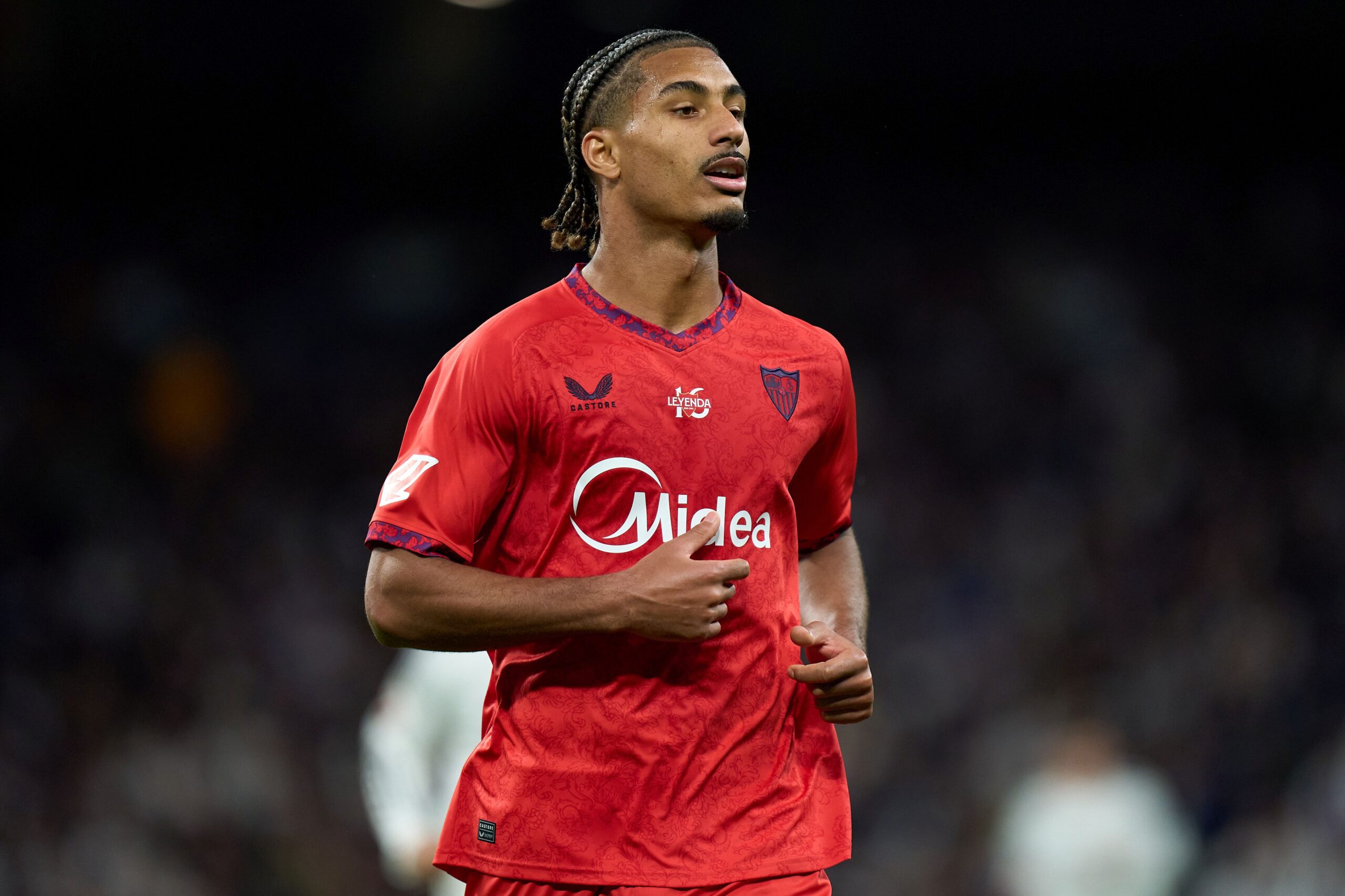 Badé con la maglia del Siviglia